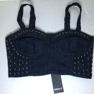 I am selling this new Forever21 demin top with studs, never worn size L